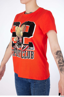 Rada casual dressed orange t-shirt upper body 0002.jpg